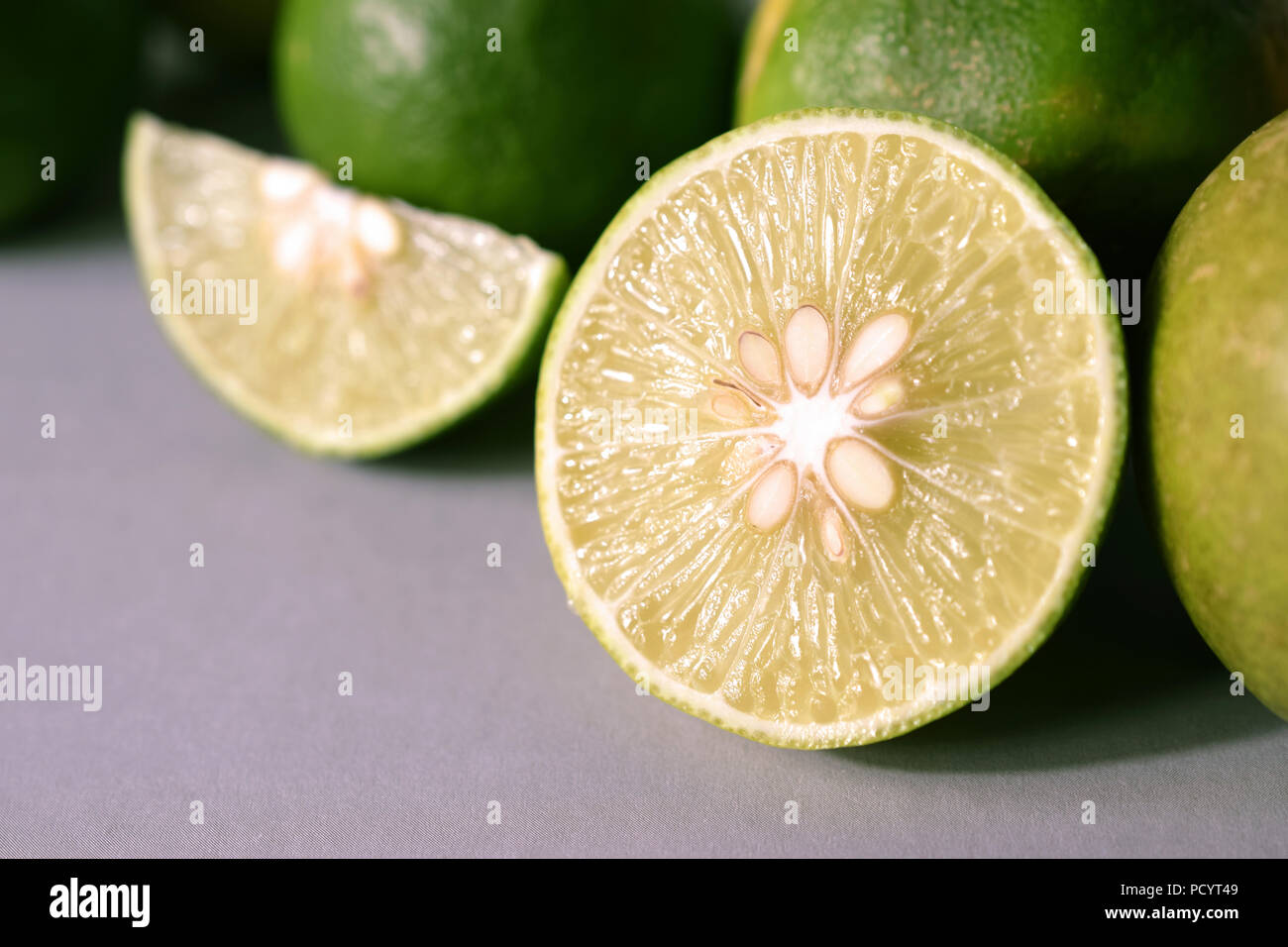 lime juice with lime slices on table. Detox diet, close-up Stock Photo