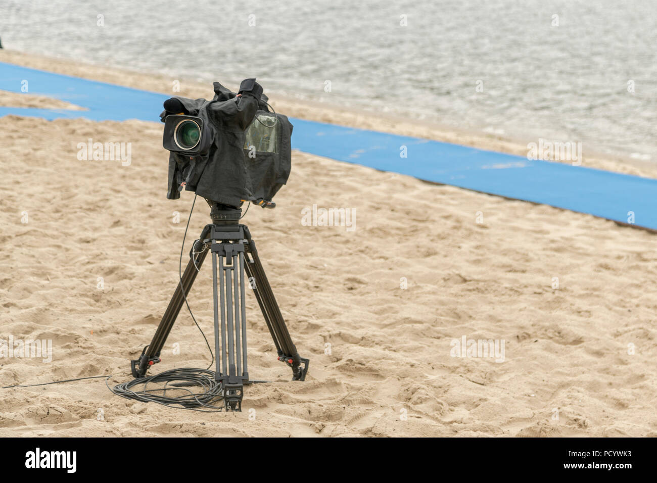 Television camera on the river beach. Camera for taking pictures on the  beach Stock Photo - Alamy