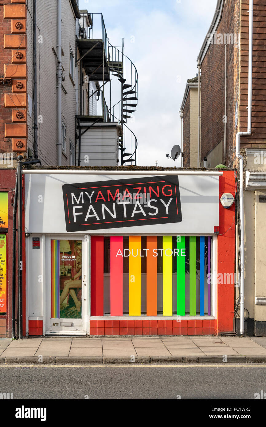 Sex shop displaying LGBT colours in the window Stock Photo Alamy