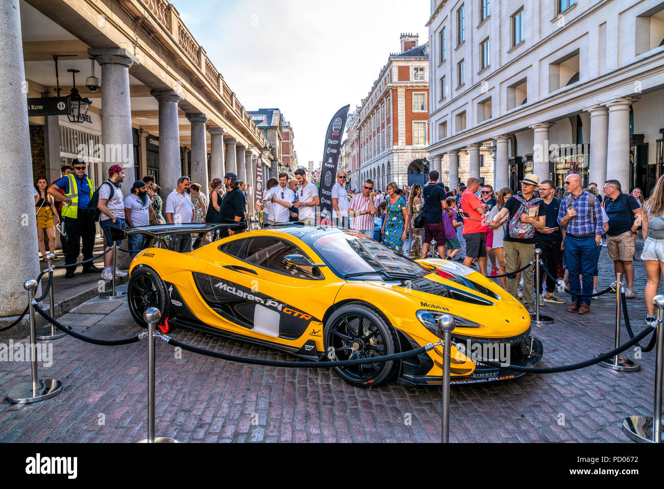 4 Aug 2018 - London, UK. Charity rally event Gumball 3000. Ultimate supercar McLaren P1 GTR in yellow is displayed at Covent Garden, London. Stock Photo