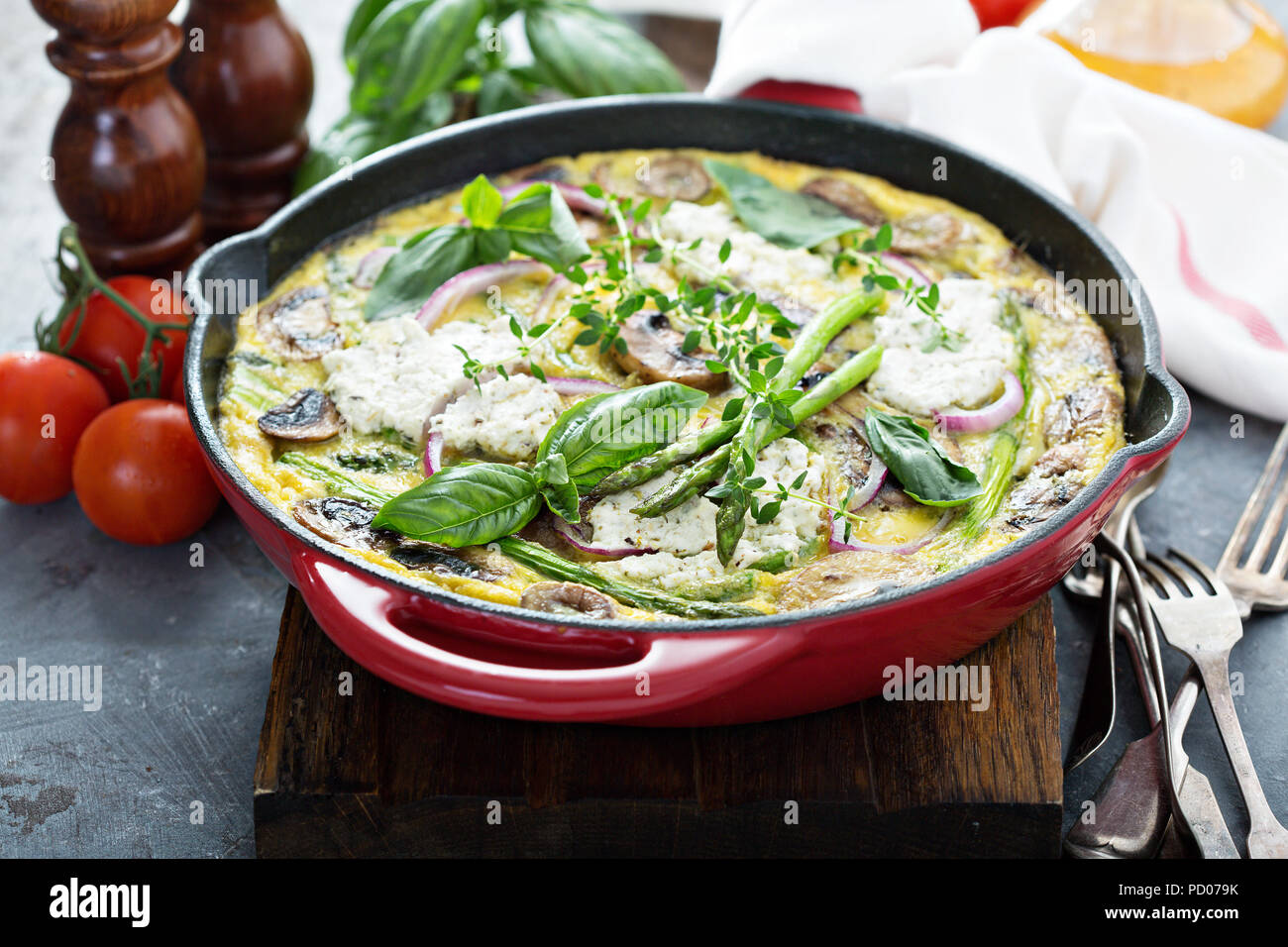 Asparagus, mushrooms and goat cheese frittata Stock Photo Alamy
