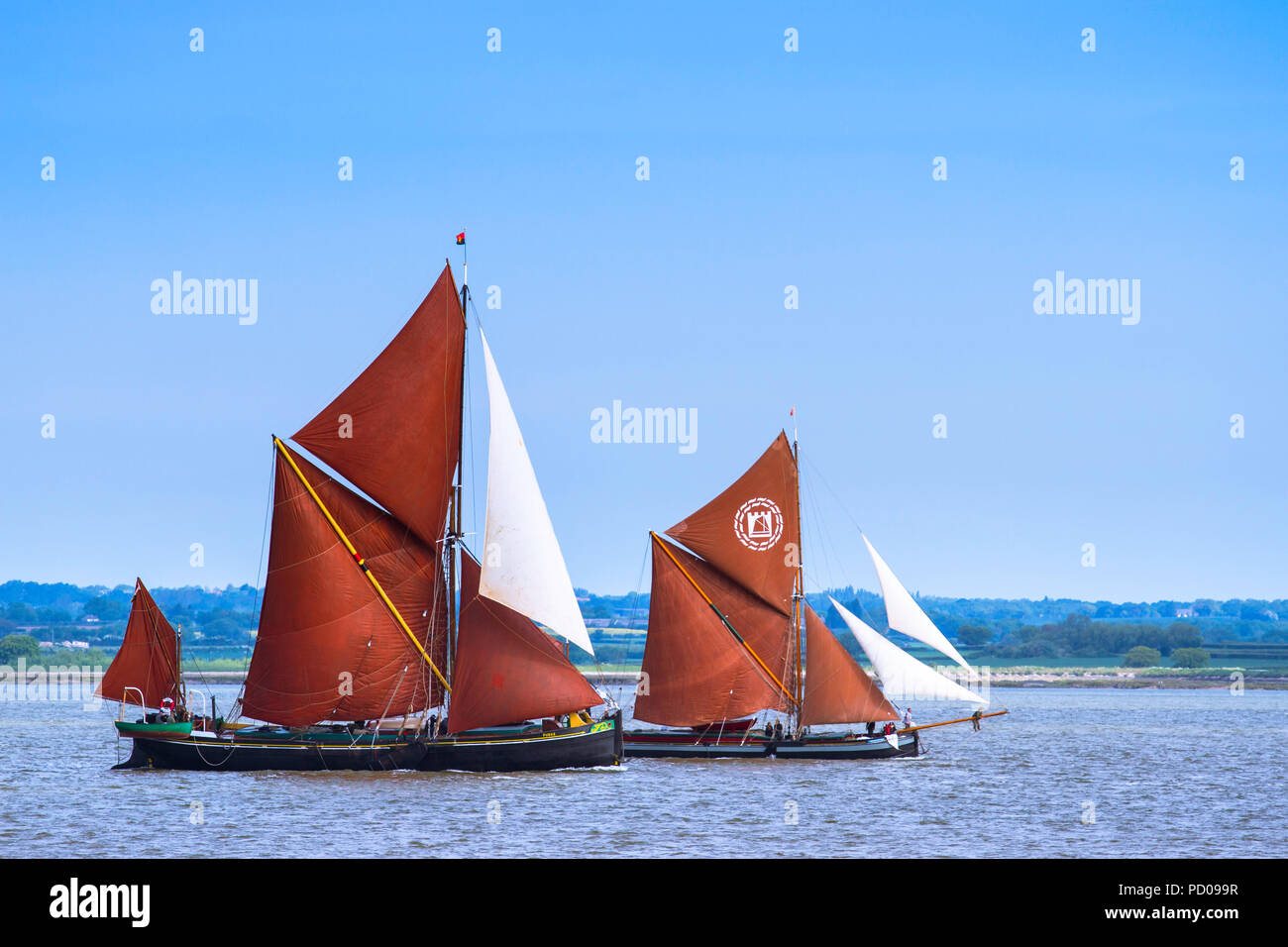 Two historic Thames sailing barges racing on the river Blackwater Stock ...