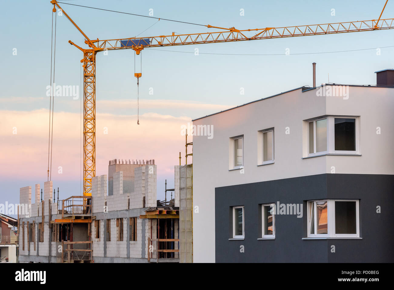 Modern residential building on a construction site Stock Photo - Alamy