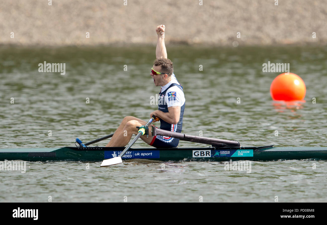Great Britain's Samuel Mottram celebrates after crossing the line to win the bronze medal in the Lightweight Men's Single Sculls Final during day four of the 2018 European Championships at Strathclyde Country Park, North Lanarkshire. Stock Photo