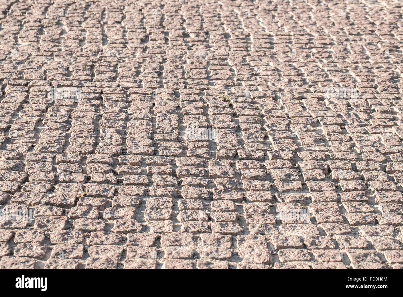 Abstract background of old cobblestone pavement close-up Stock Photo ...