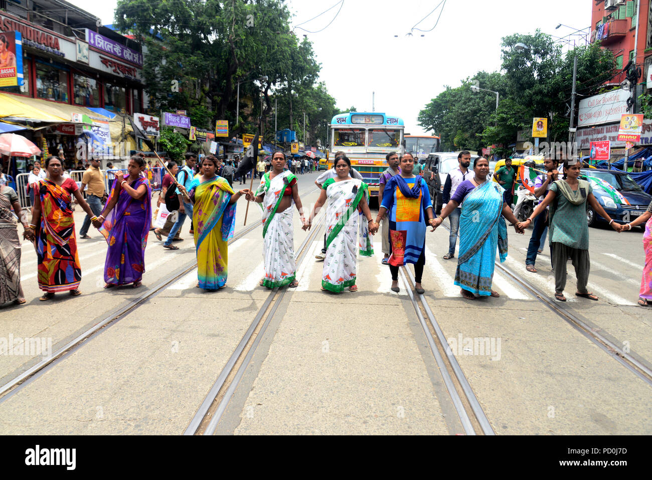 Kolkata, India. 04th Aug, 2018. TMC women activist holds black flag to protest against the manhandling and harassment of TMC delegation at Silchar Airport Trinamool Congress or TMC activist observe Black Day to protest against the manhandling and harassment of TMC delegation at Silchar Airport. Credit: Saikat Paul/Pacific Press/Alamy Live News Stock Photo