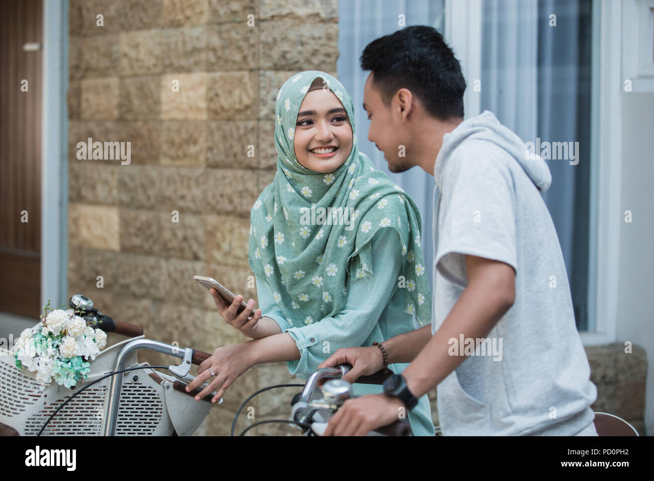 couple are going to ride a bicycle Stock Photo