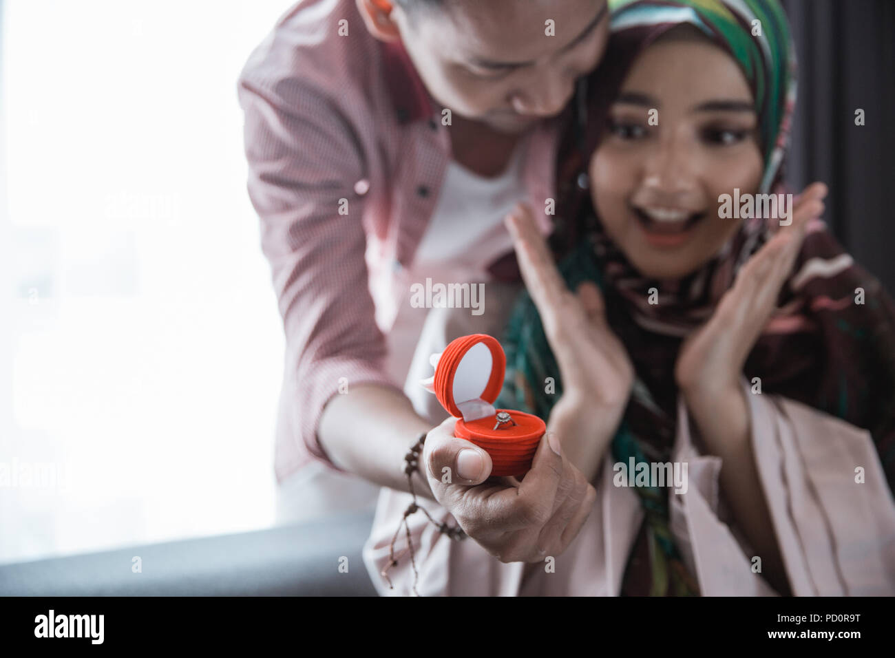 muslim woman get a ring Stock Photo