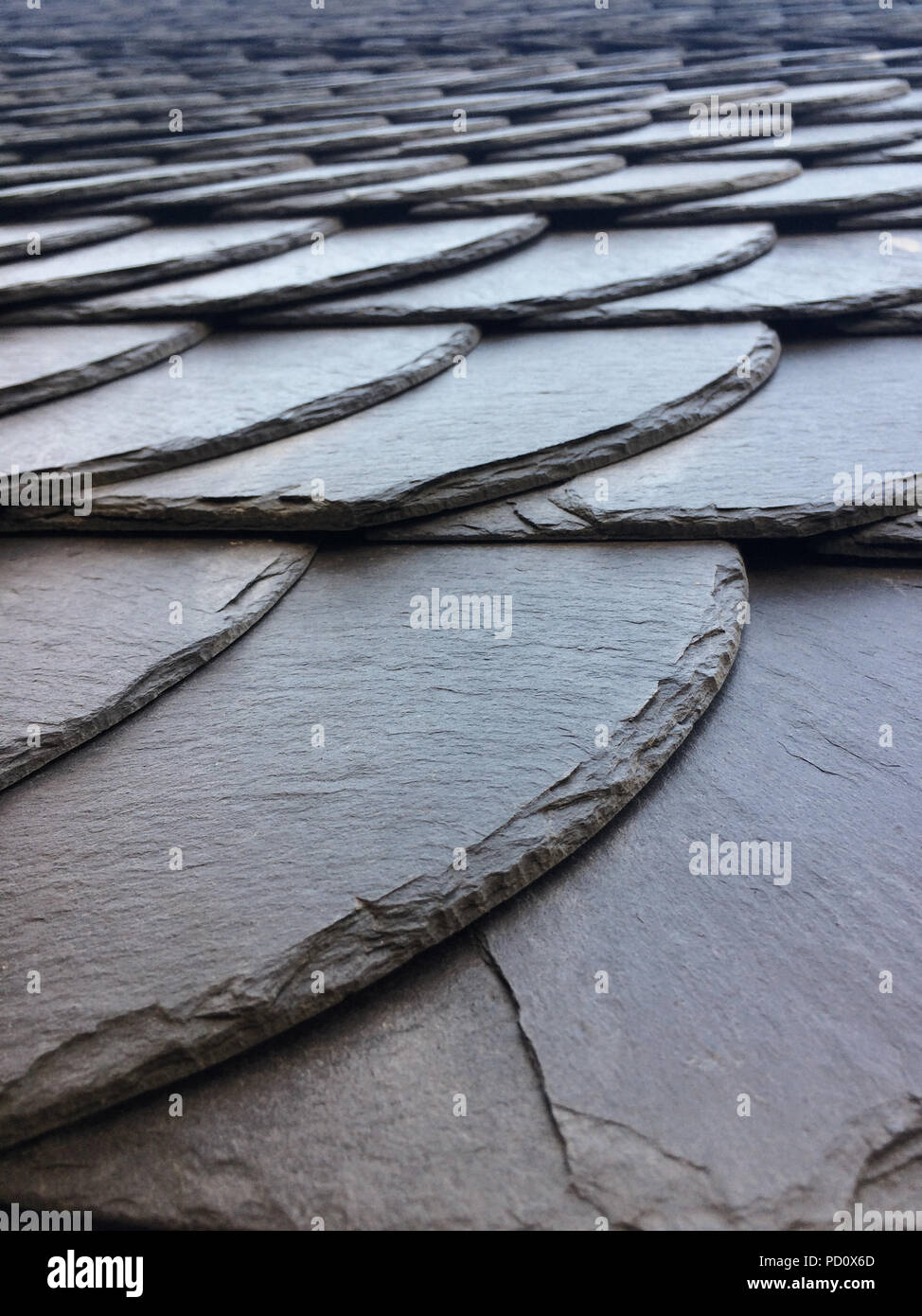 Details of black shale tiles on a house Stock Photo