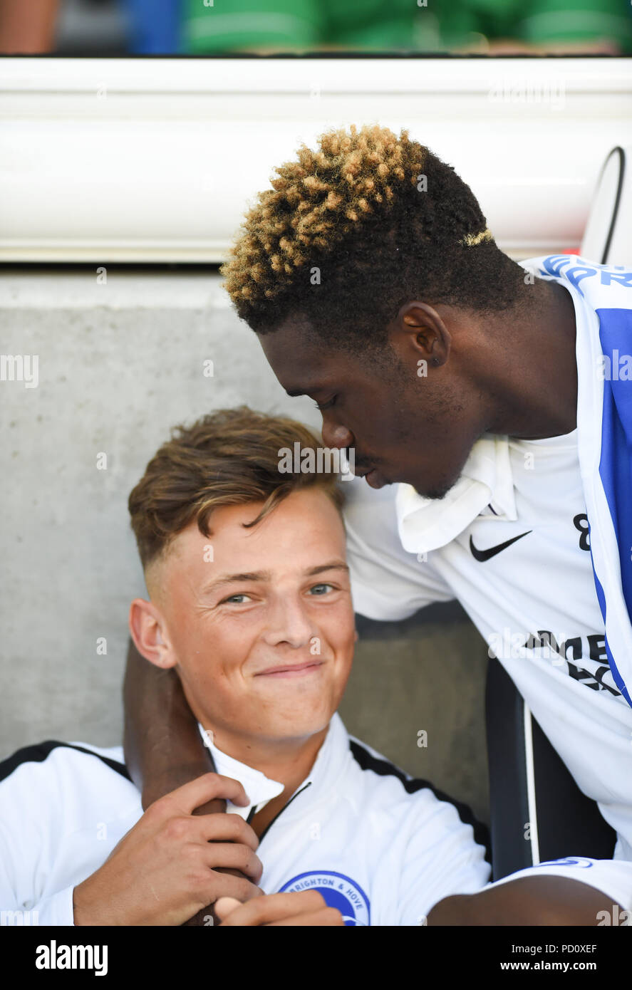 Brighton UK 3rd August 2018 -  Yves Bissouma of Brighton jokes with Ben White during the pre season friendly football match between  Brighton and Hove Albion  and Nantes at the American Express Community Stadium - Photo Simon Dack / Telephoto Images Editorial use only. No merchandising. For Football images FA and Premier League restrictions apply inc. no internet/mobile usage without FAPL license - for details contact Football Dataco Stock Photo