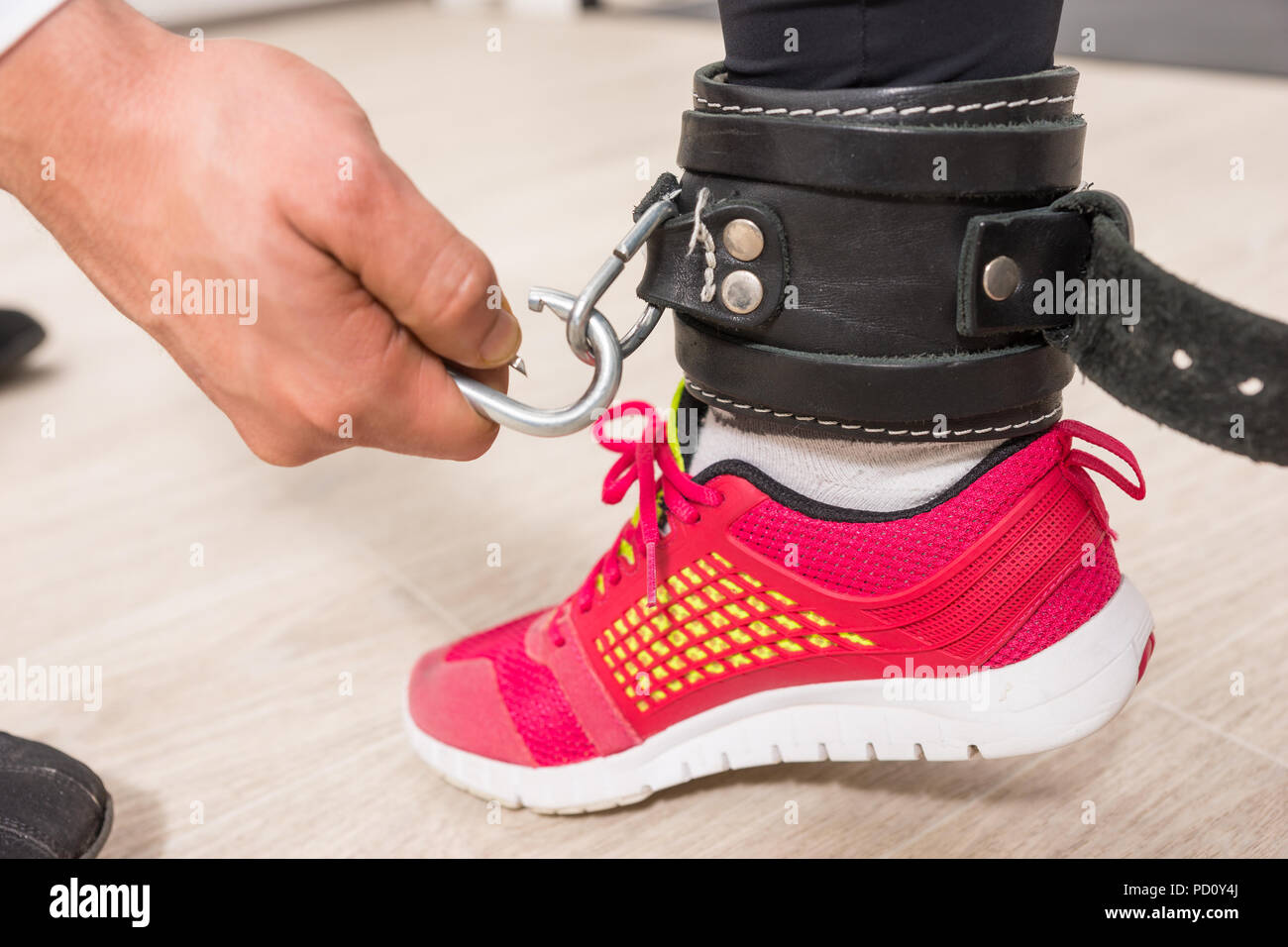 shoes with belt around ankle