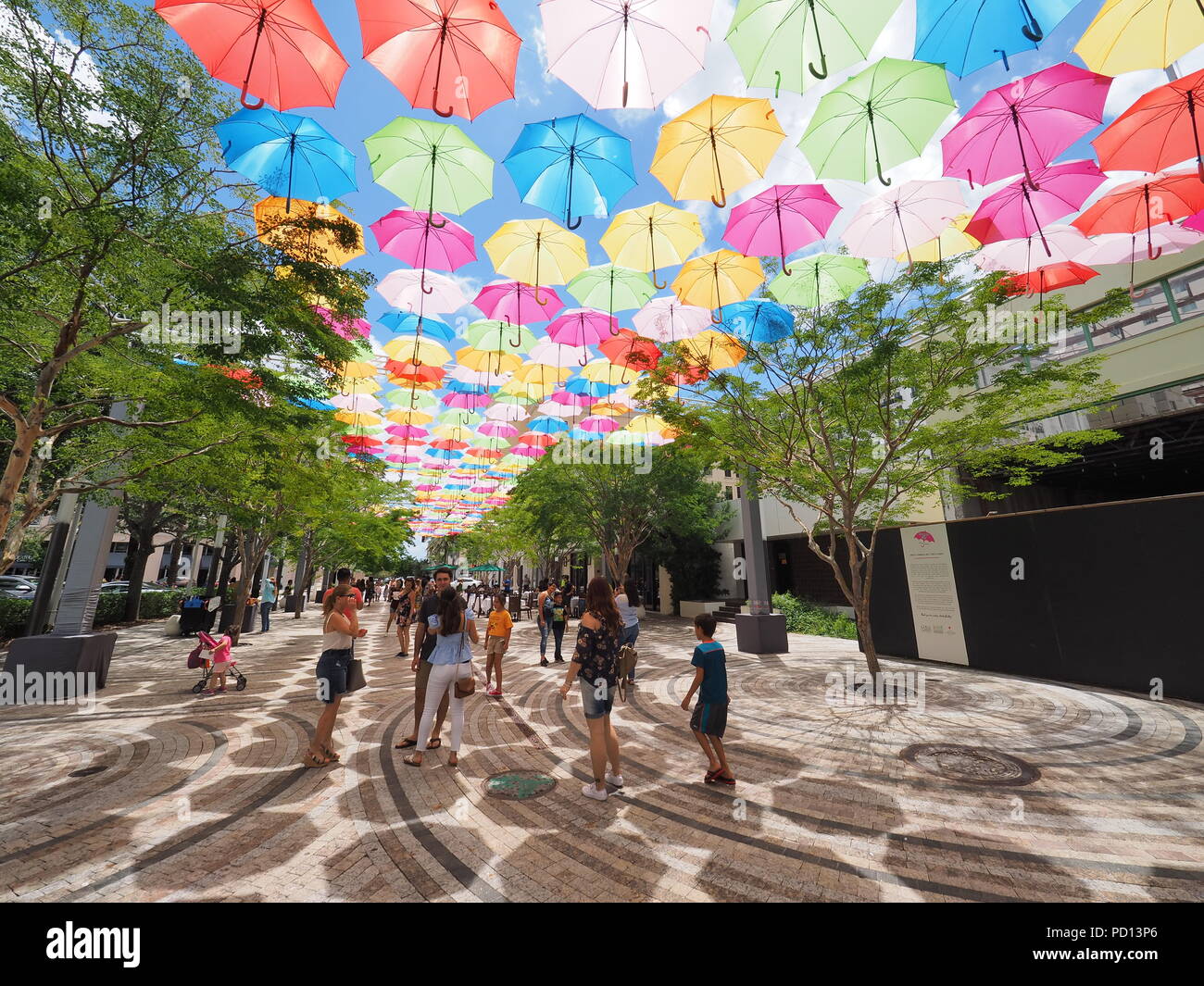 Umbrella Sky in Coral Gables, Florida, a joint art project by the City of Coral Gables and the Portuguese company Sextafeira. Stock Photo