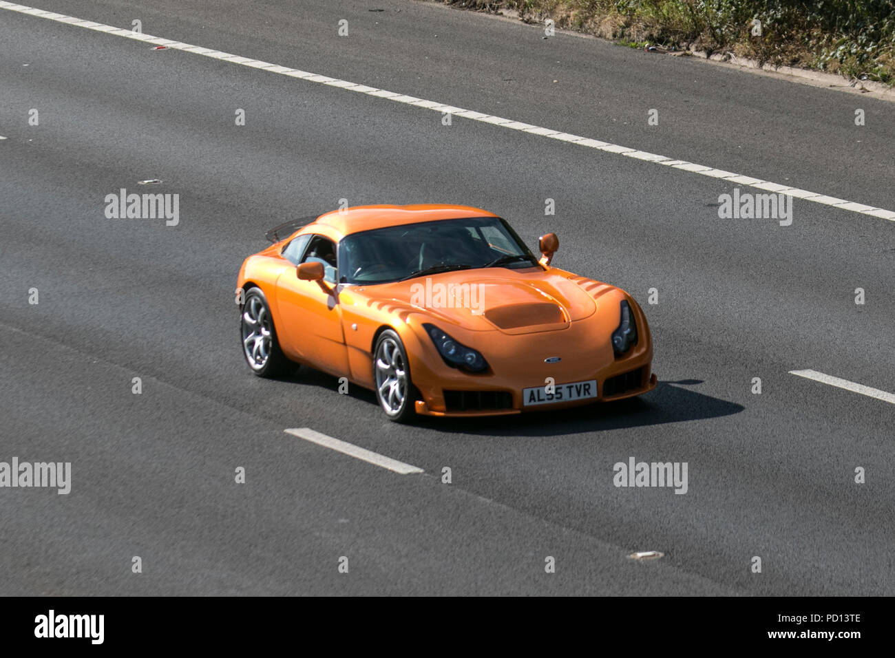 2005 55 plate Orange British Tvr Sagaris 3996cc petrol coupe is a sports car designed and built by the British manufacturer TVR in Blackpool, Lancashire. UK Stock Photo