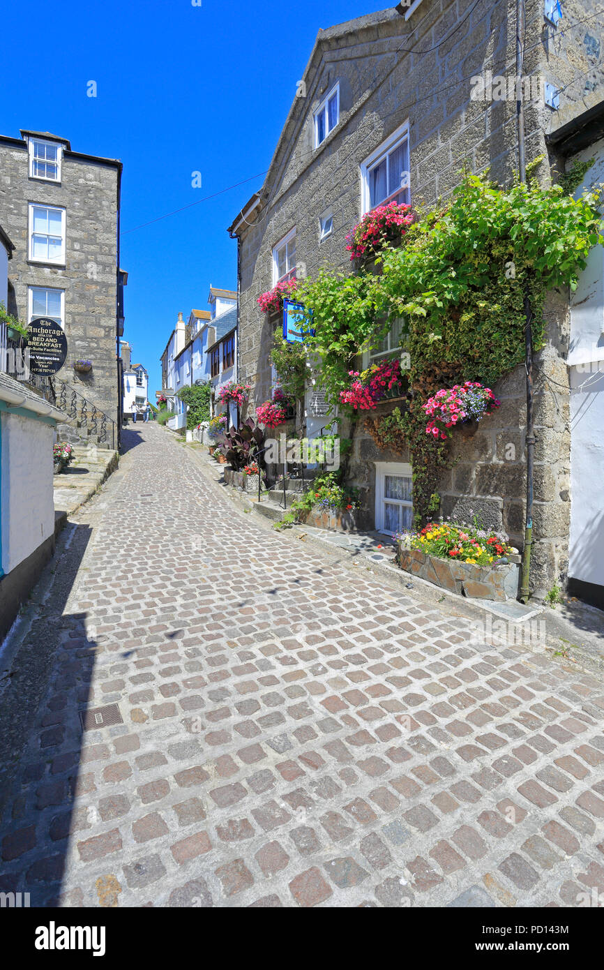 Whitewashed B&B's along a pretty street in St Ives, Cornwall, England, UK. Stock Photo