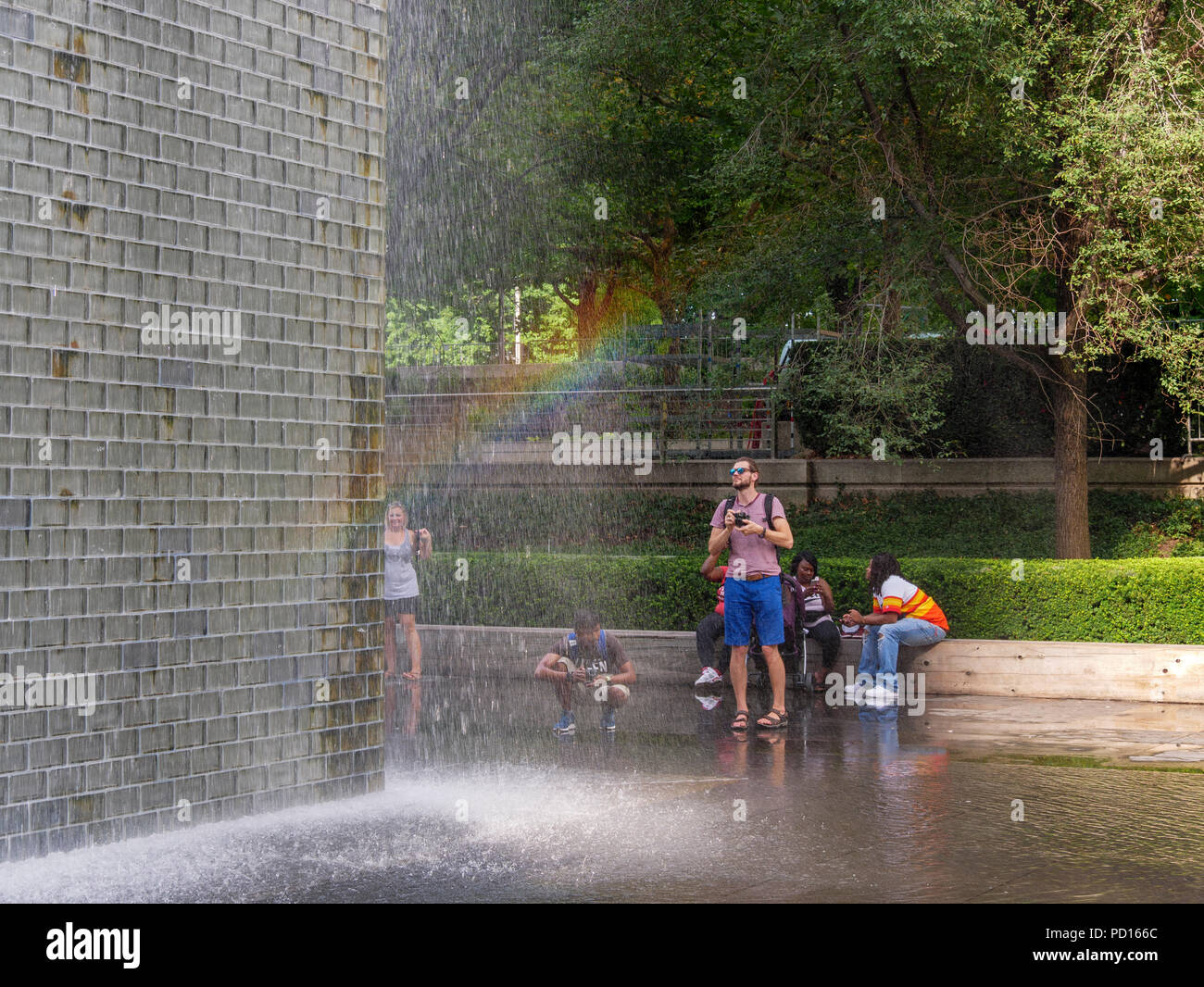 Crown Fountain in Chicago's Millennium Park generates its own rainbow. Stock Photo