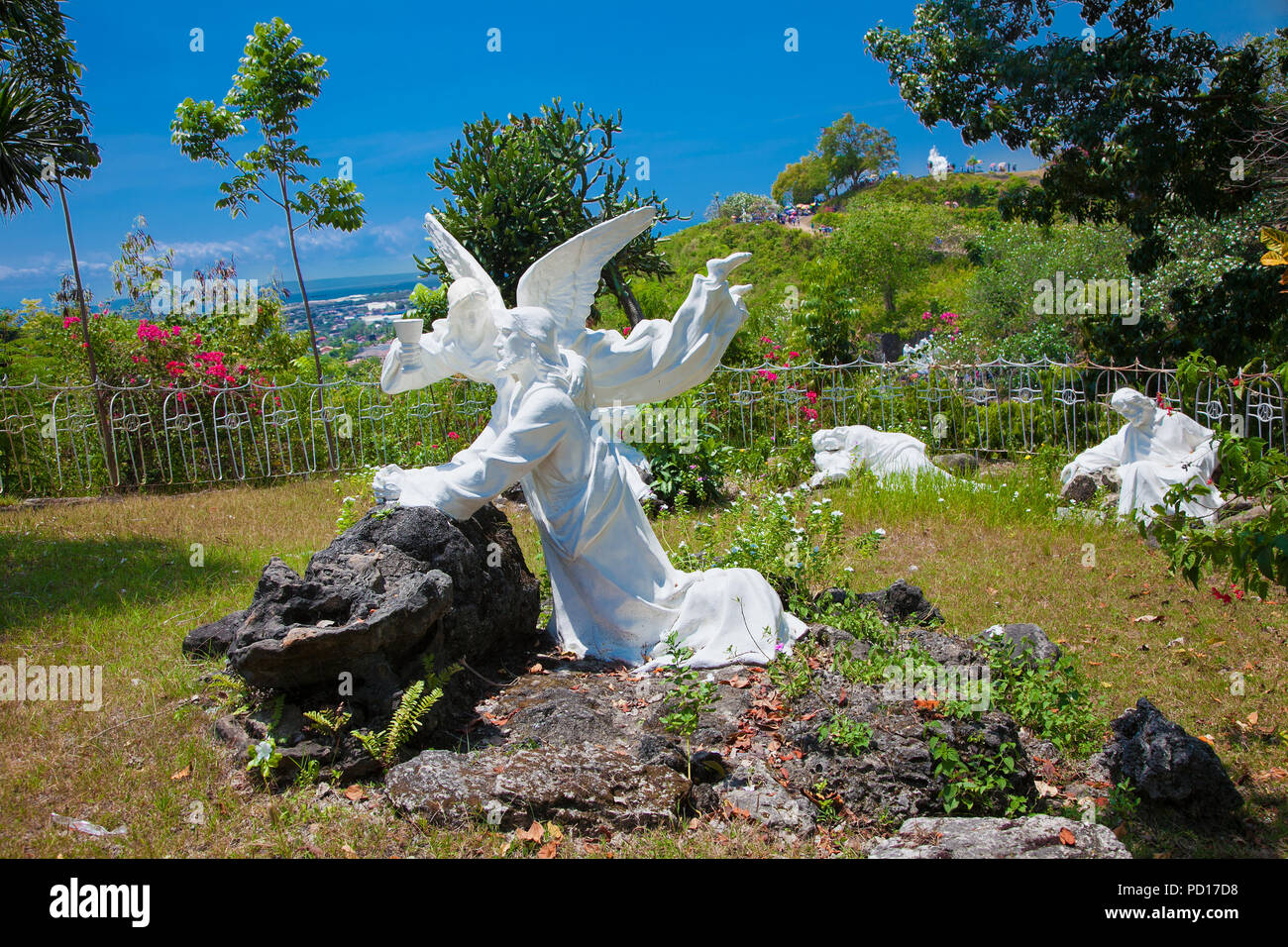 CEBU, PHILIPPINES-MARCH 25, 2106. Hrist with angel sculpture in Celestial Garden at Banawa Hills on March 25, 2016, Cebu city. Philippines. It is most Stock Photo