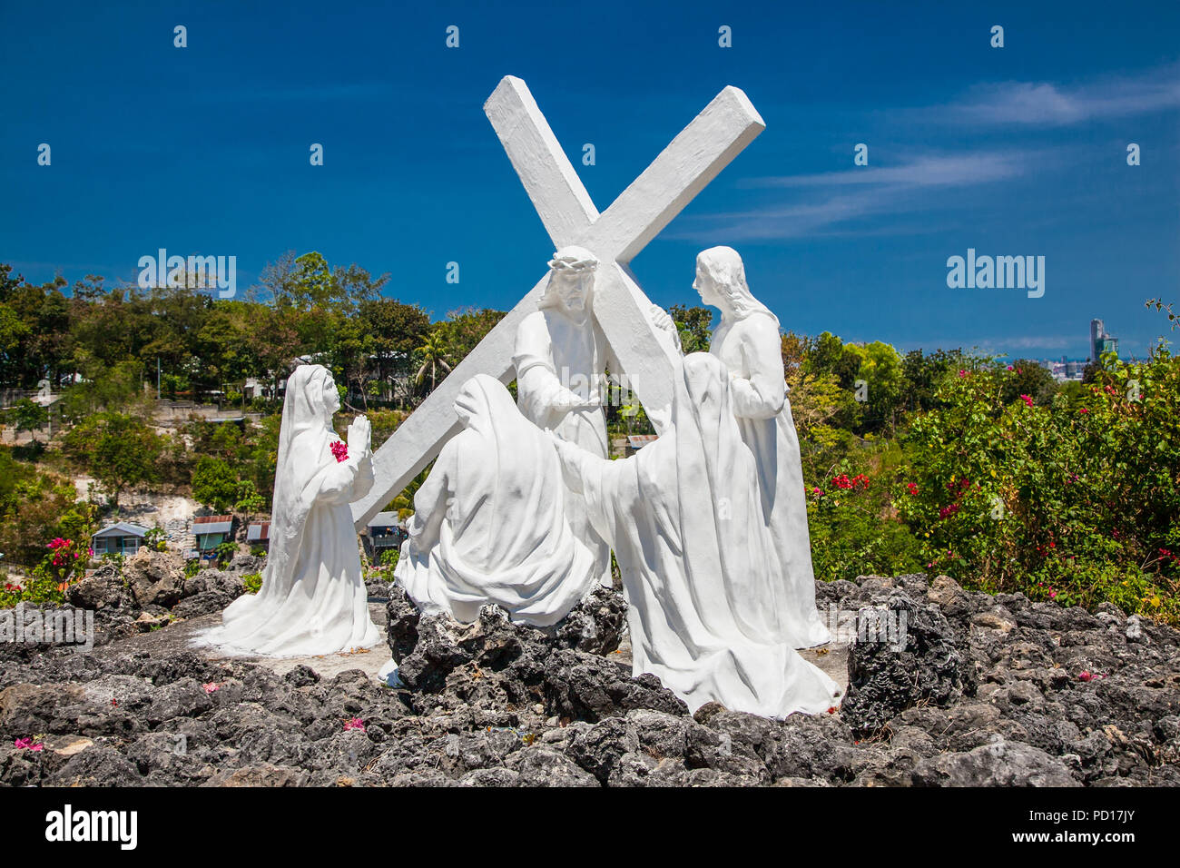 CEBU, PHILIPPINES-MARCH 25, 2106. Hrist with pilgrims sculpture in Celestial Garden at Banawa Hills on March 25, 2016, Cebu city. Philippines. It is m Stock Photo