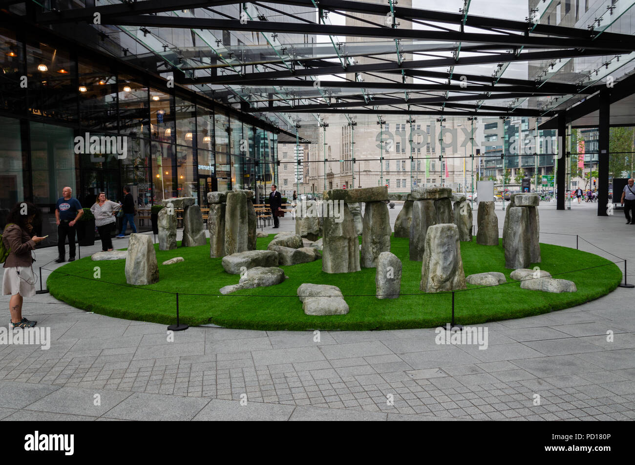 Liverpool, UK: Aug 3, 2018: A model of a stone henge is displayed in the main entrance to the RIBA North building in the waterfront of Liverpool Stock Photo