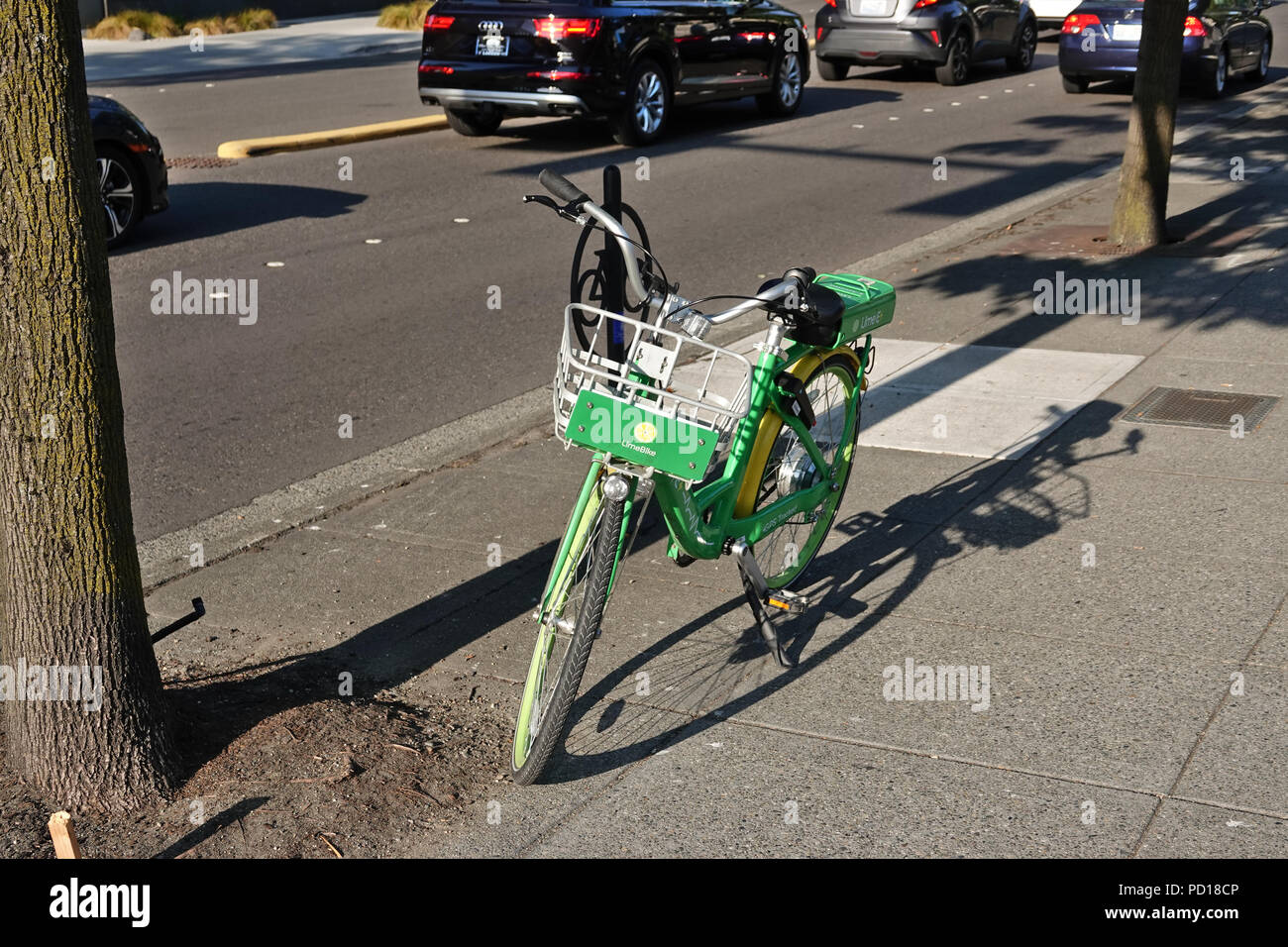 LimeBike E+ rental electric bicycle parked on a street in Bellevue, WA, USA; August 2018 Stock Photo