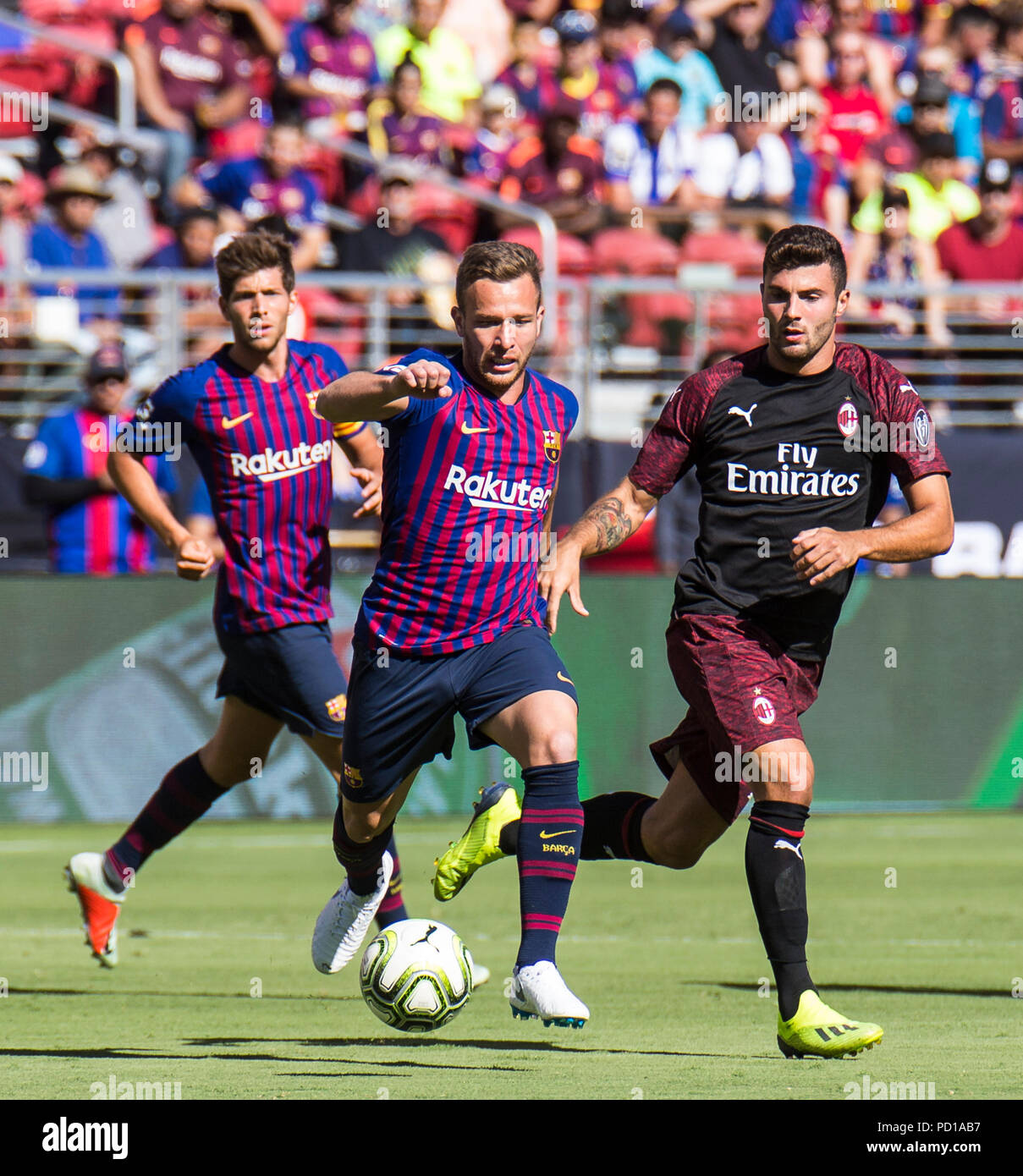 Santa Clara, CA USA. 04th Aug, 2018. FC Barcelona # 4 Arthur Melo protect  the ball at mid field during the international championship cup game  between A.C. Milan and FC Barcelona 0-1