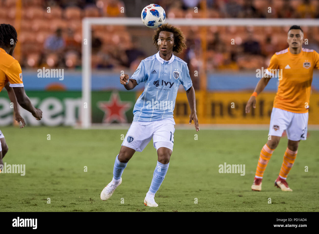 Houston, USA. 4 August 2018.  16 year old Sporting KC midfielder Gianluca Busio (13) controls the ball during an MLS soccer match between the Houston Dynamo and Sporting Kansas City at BBVA Compass Stadium in Houston, TX. Busio became the third-youngest player to ever start an MLS game. Kansas City won the match 1 to 0.Trask Smith/CSM Credit: Cal Sport Media/Alamy Live News Stock Photo