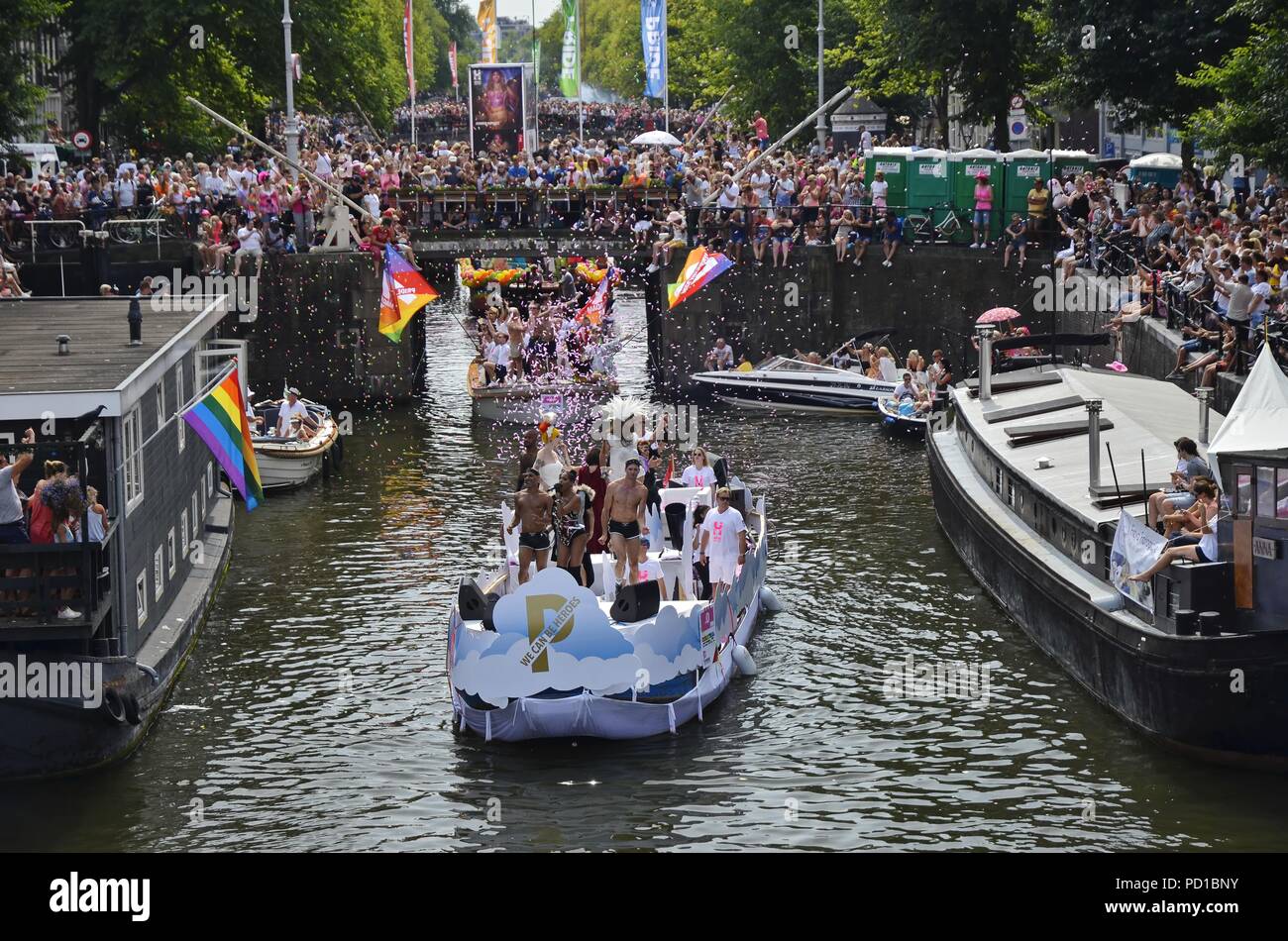 Amsterdam, Netherlands - August 4, 2018: The lead boat (number 0) carrying the theme slogen, 'We Can Be Heroes' at the time of the Pride boat parade Credit: Adam Szuly Photography/Alamy Live News Stock Photo