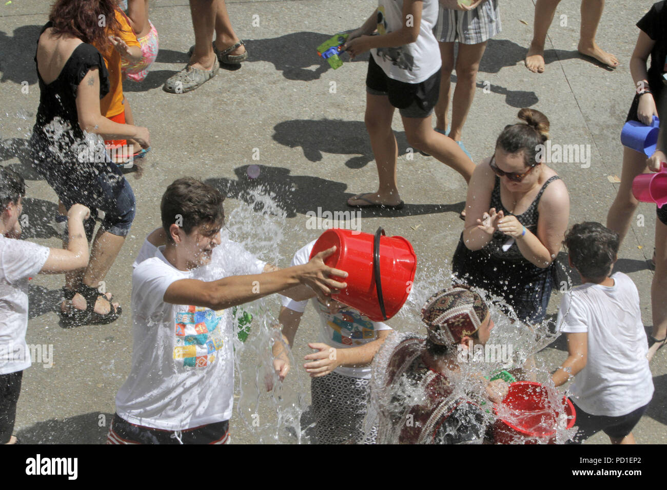 Bucharest, Romania. 5th Aug, 2018. People take part in a water fight called Varatavar during the Armenian Street Festival in Bucharest, capital of Romania, Aug. 5, 2018. Credit: Gabriel Petrescu/Xinhua/Alamy Live News Stock Photo