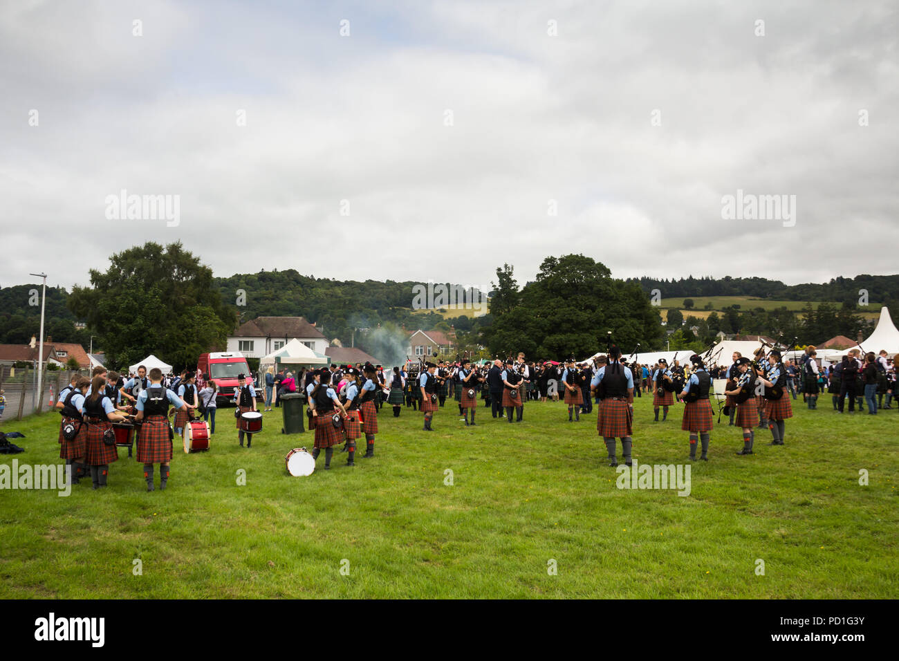 Stirling, Scotland, UK. 5th August 2018. Strathallan Games Park near Stirling is the venue for the 167th Bridge of Allan Highland Games.  Scottish pipe bands muster outside the main ring to tune their instruments and engage in a final practise, ready to compete in the pipe band competition. Credit Joseph Clemson, JY News Images/Alamy. Stock Photo