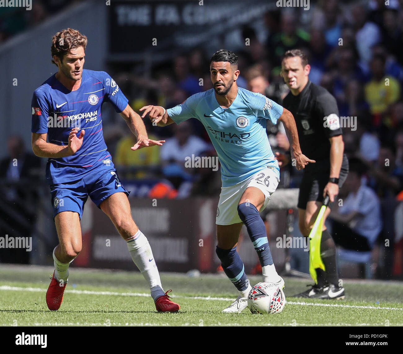 Marcos Alonso of Chelsea and Riyad Marhez of Manchester City during the FA Community Shield match between Chelsea and Manchester City at Wembley Stadium on August 5th 2018 in London, England. (Photo by John Rainford/phcimages.com) Stock Photo