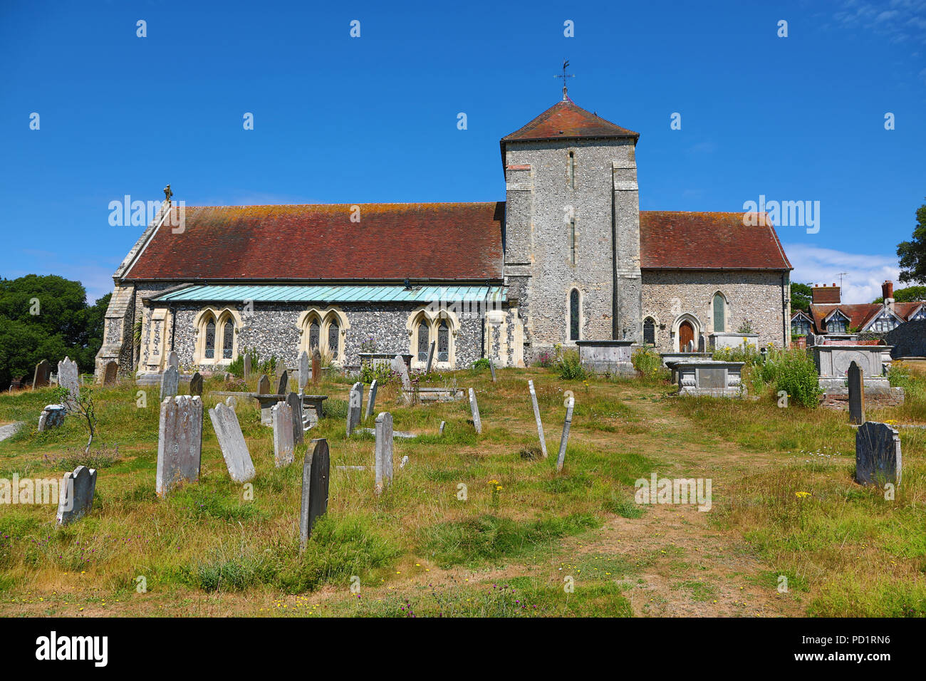 St Margaret's Church and graveyard in the village of Rottingdean, East Sussex, England, United Kingdom Stock Photo