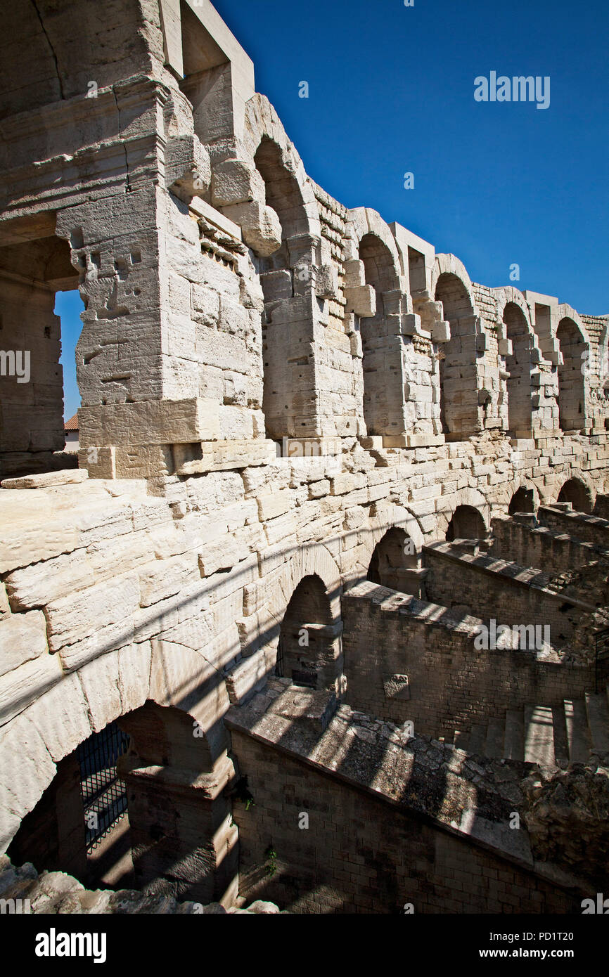 The facade of the Roman Arena at Arles, France. Stock Photo