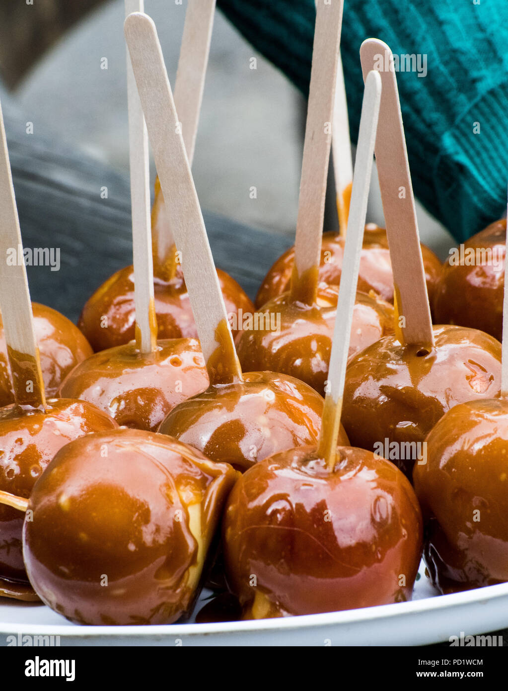 old fashioned toffee aplles at a Church Fete Stock Photo