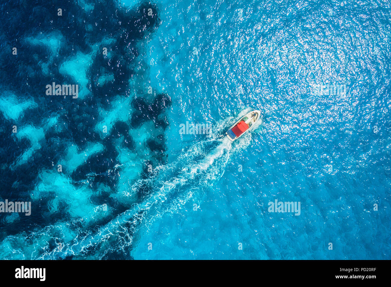 Motorboat at the sea in balearic islands. Aerial view of floating boat ...