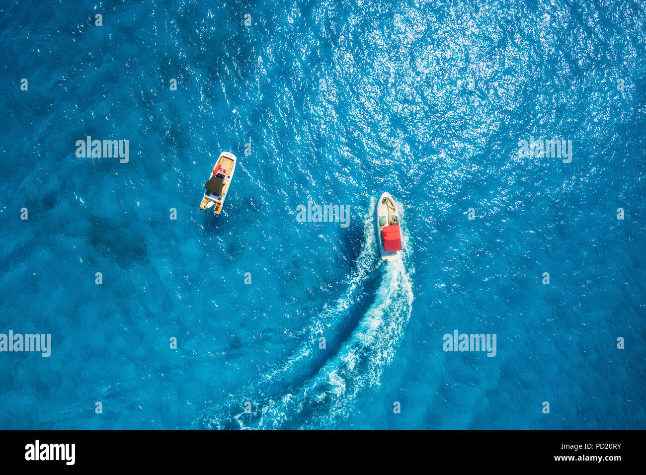 Motorboat at the sea in balearic islands. Aerial view of floating boat ...