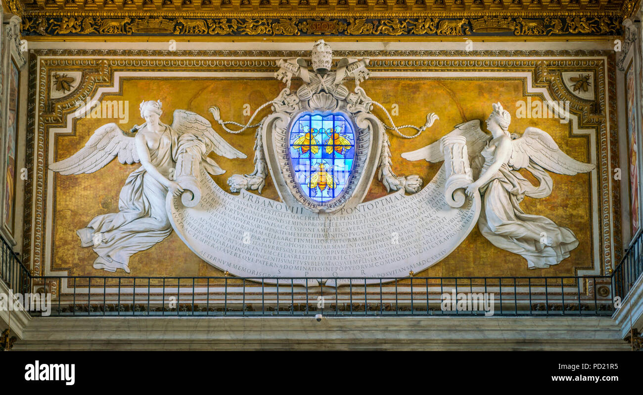 Counterfacade with angles supporting the Barberini emblem, designed by Bernini, in the Basilica of Santa Maria in Ara Coeli, Rome, Italy. Stock Photo
