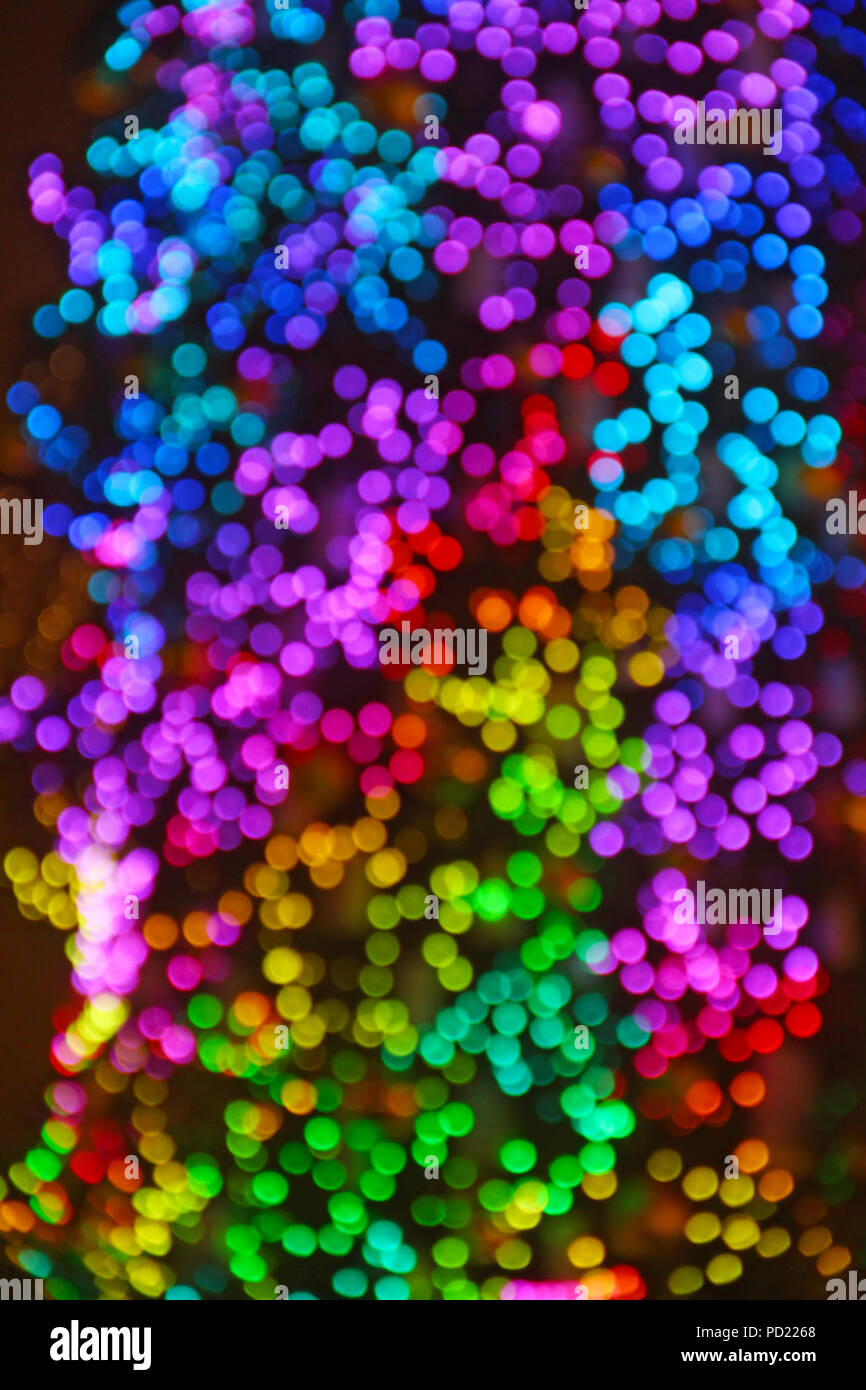 Multicolored abstract bokeh background with new year tree lights Stock Photo