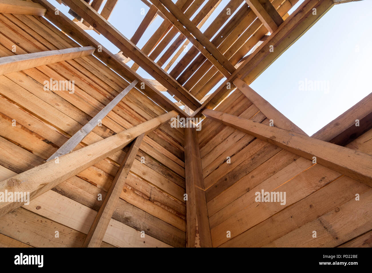 New Wooden House Under Construction Close Up Of Walls And Roof