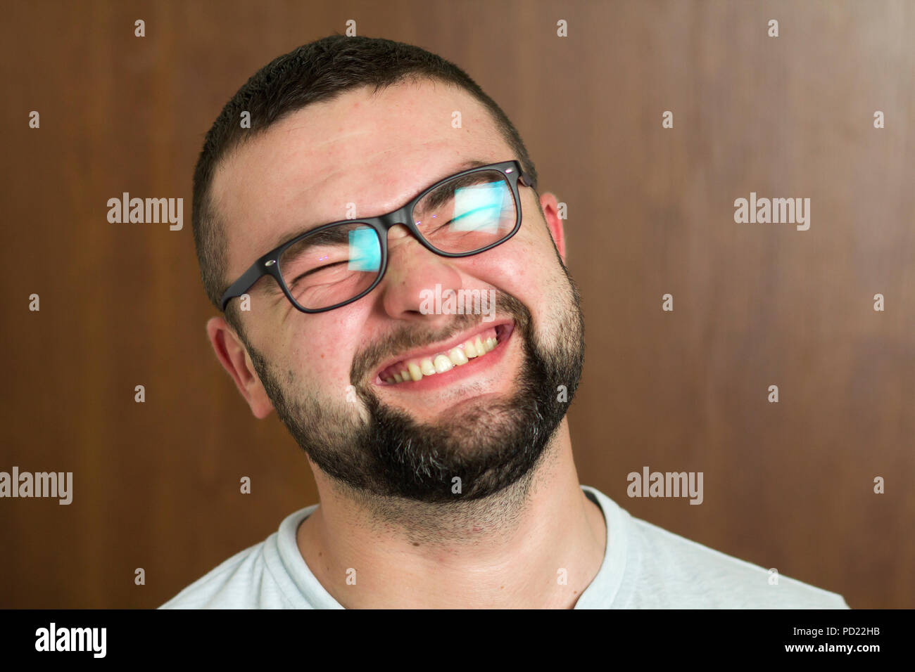 Portrait Of Handsome Bearded Black Haired Intelligent Modern Young