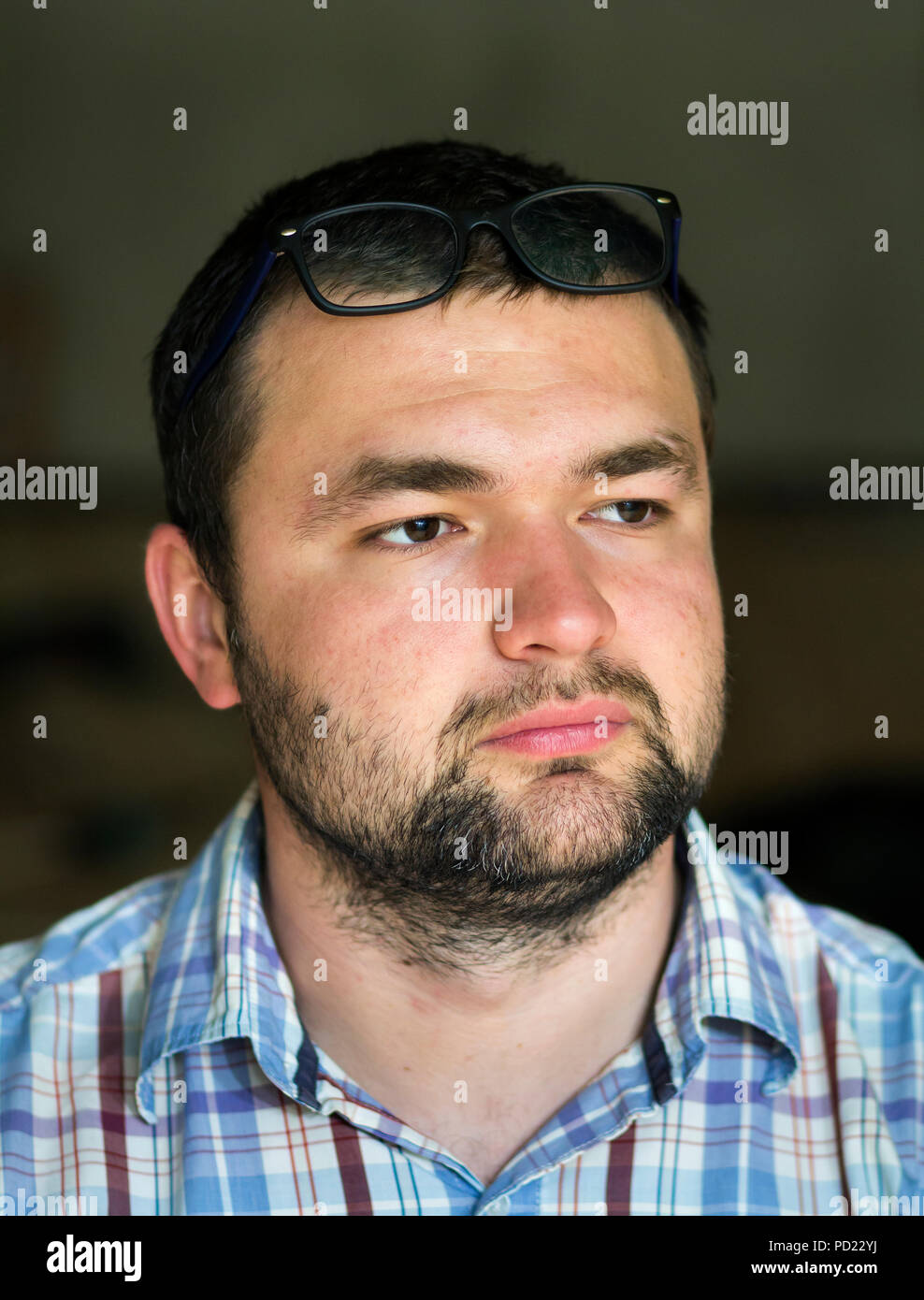 Portrait Of Handsome Bearded Black Haired Intelligent Modern Young