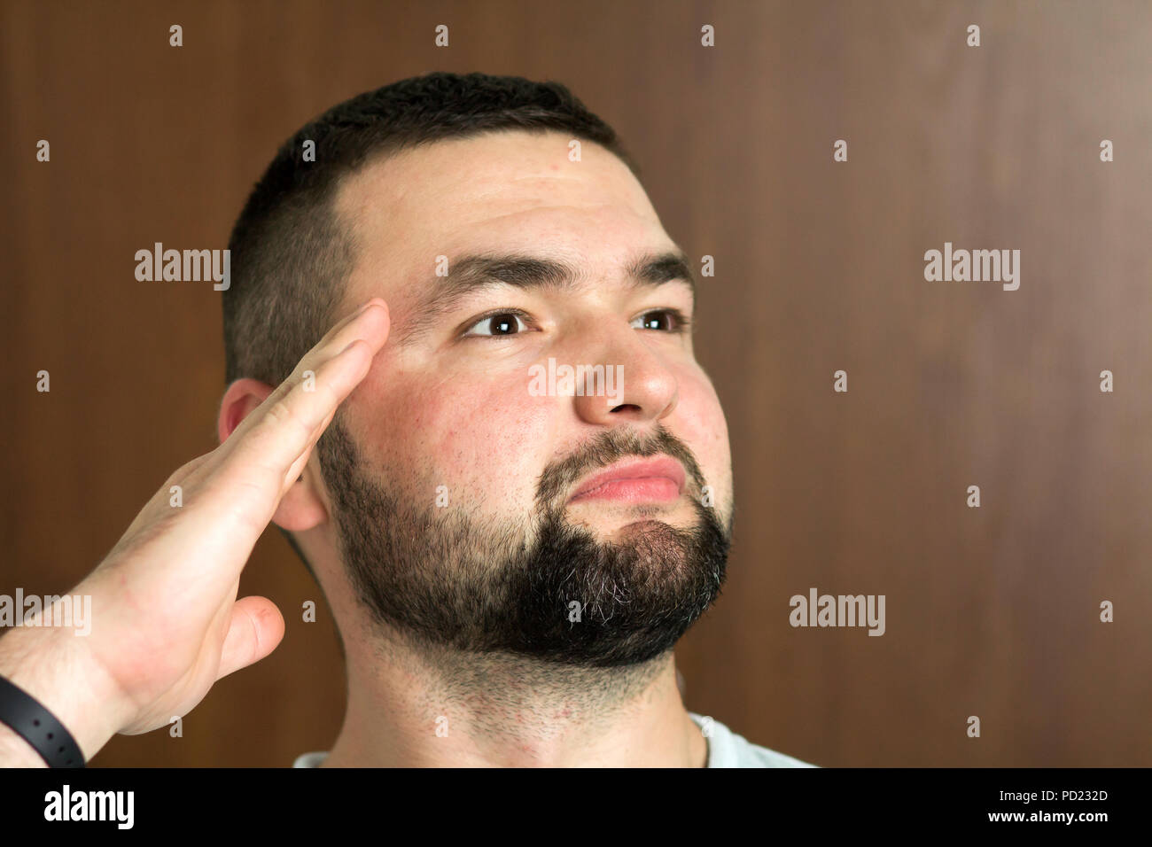 Portrait Of Handsome Bearded Black Haired Intelligent Modern Young