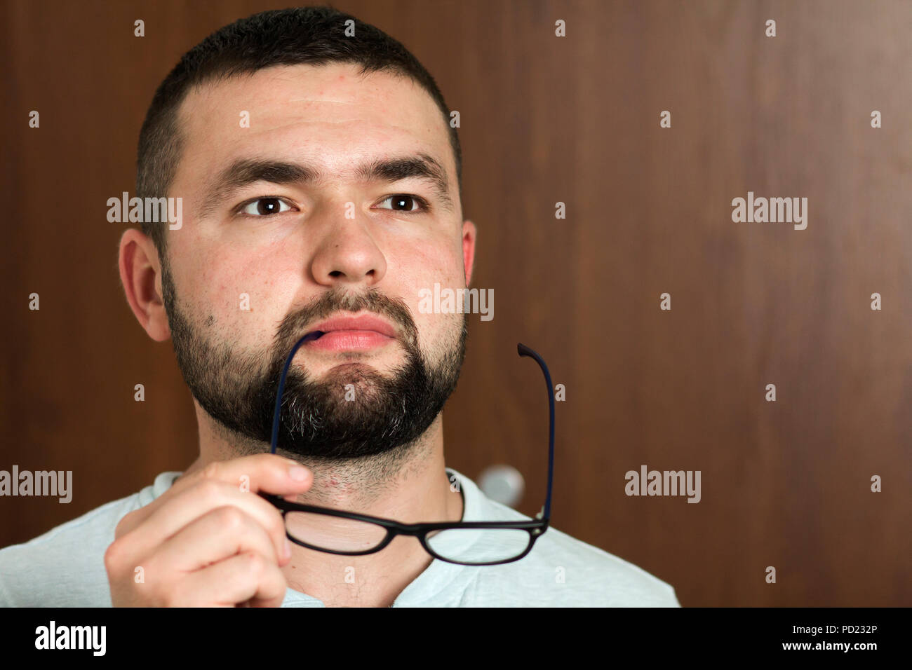 Portrait Of Handsome Bearded Black Haired Intelligent Modern Young