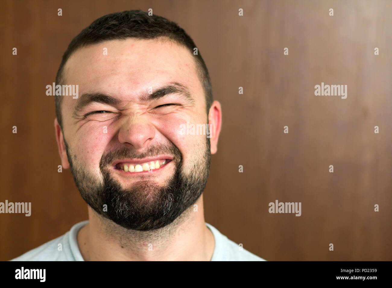 Portrait Of Handsome Bearded Black Haired Intelligent Modern Young