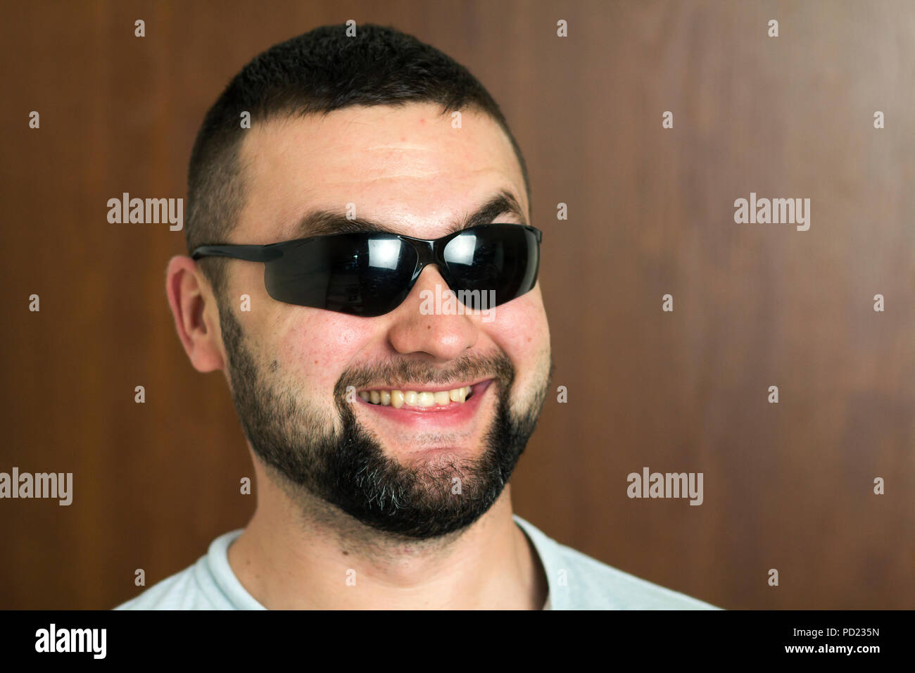 Portrait Of Handsome Bearded Black Haired Intelligent Modern Young