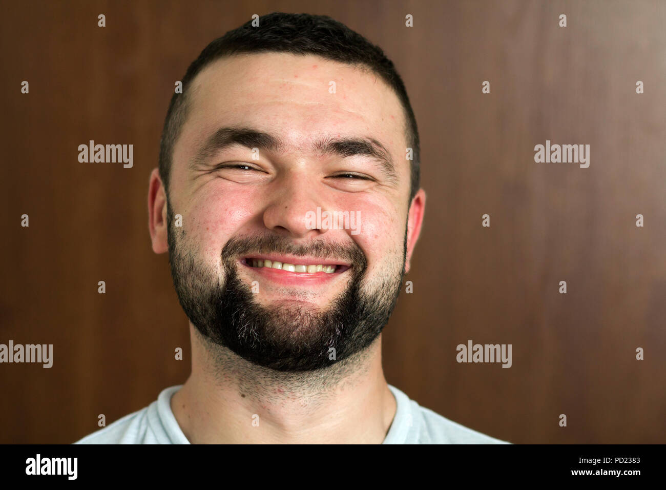 Portrait Of Handsome Bearded Black Haired Intelligent Modern Young