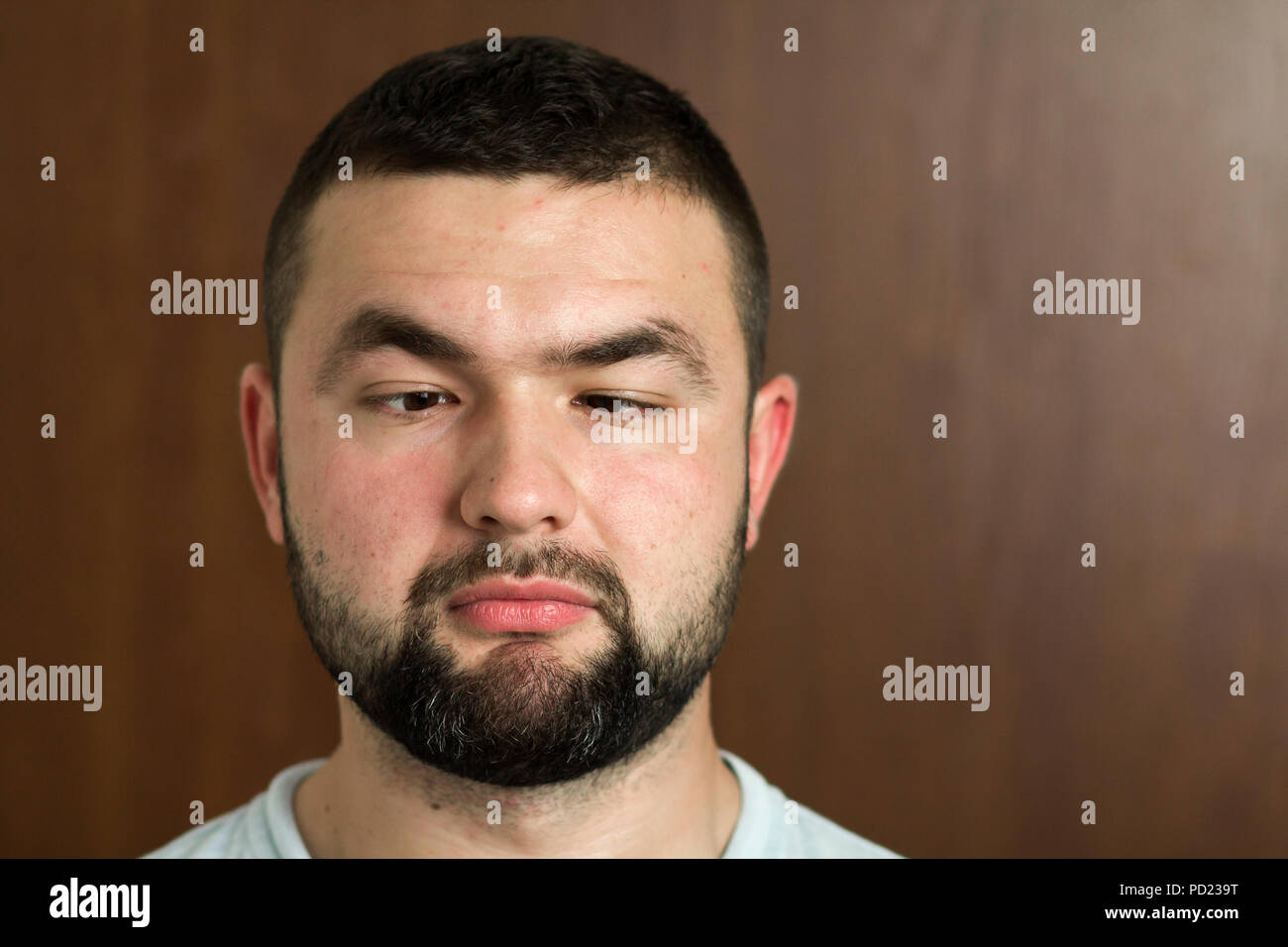 Portrait Of Handsome Bearded Black Haired Intelligent Modern Young