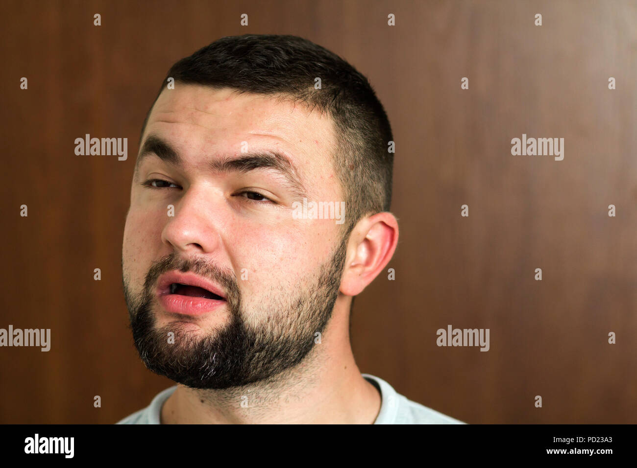 Portrait Of Handsome Bearded Black Haired Intelligent Modern Young