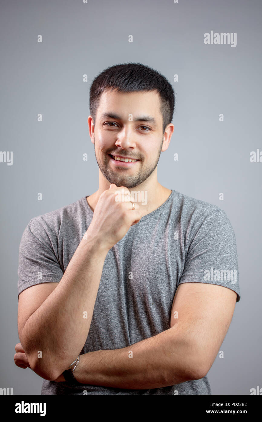 joyful wellbuilt man in casual outfit. personal fitness trainer.close