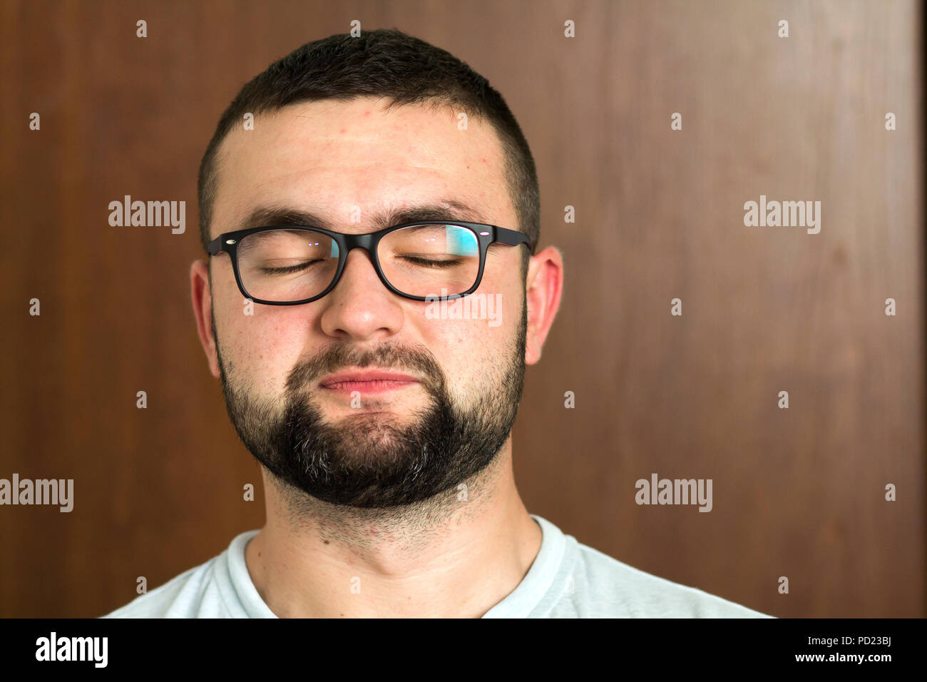 Portrait Of Handsome Bearded Black Haired Intelligent Modern Young