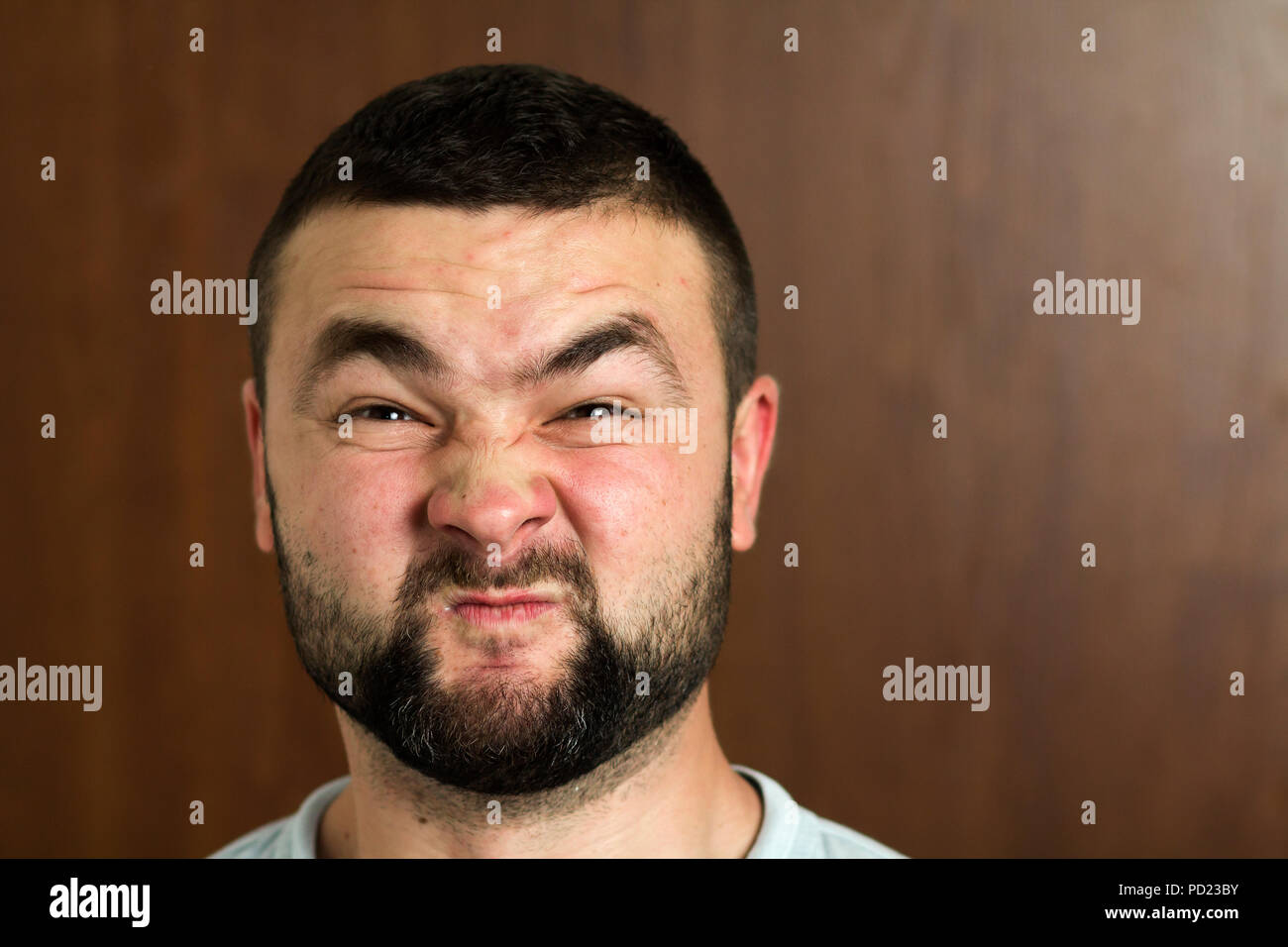 Portrait Of Handsome Bearded Black Haired Intelligent Modern Young