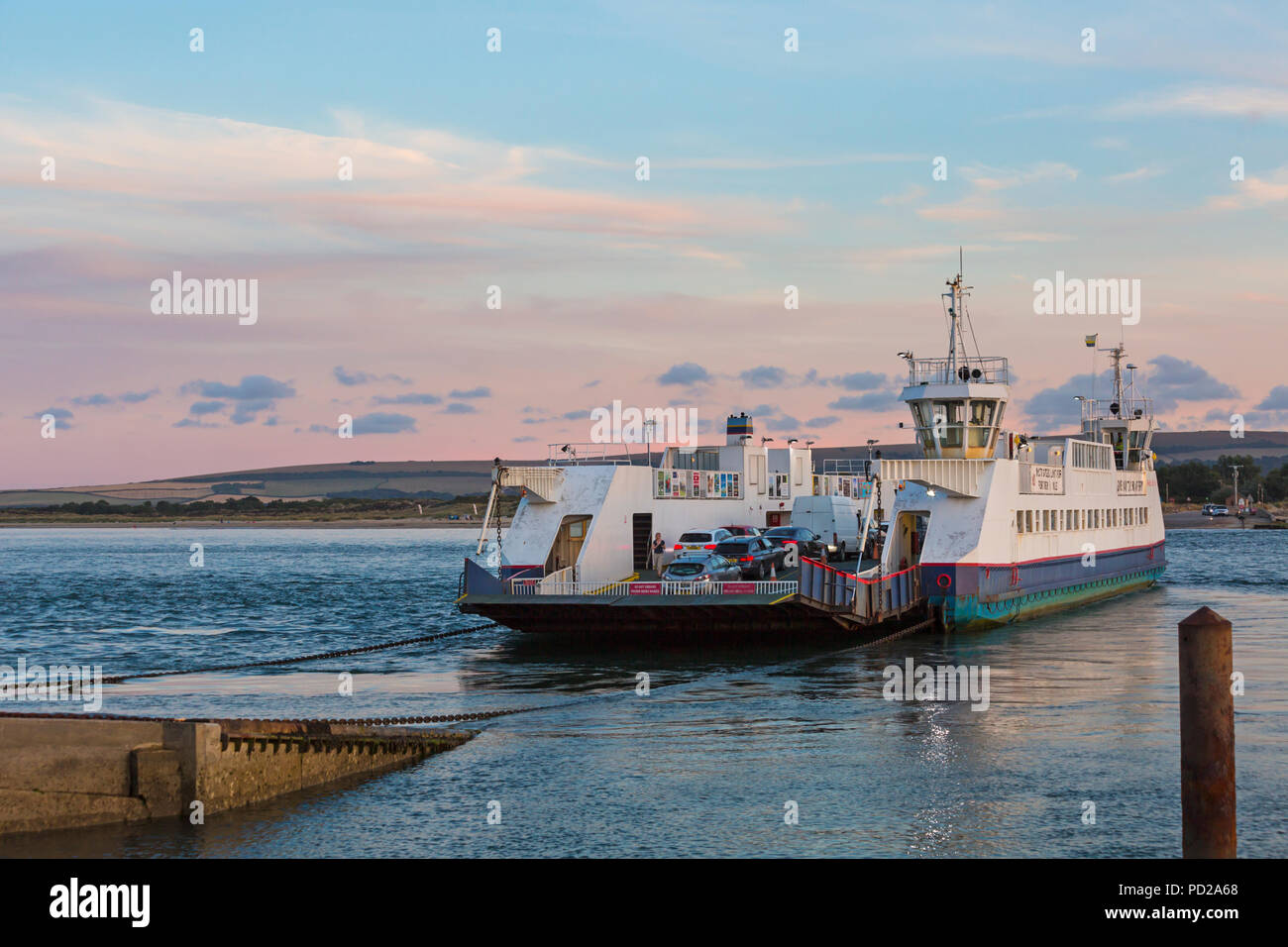Vehicles, cars crossing on Bramble Bush Bay Ferry - Studland to ...